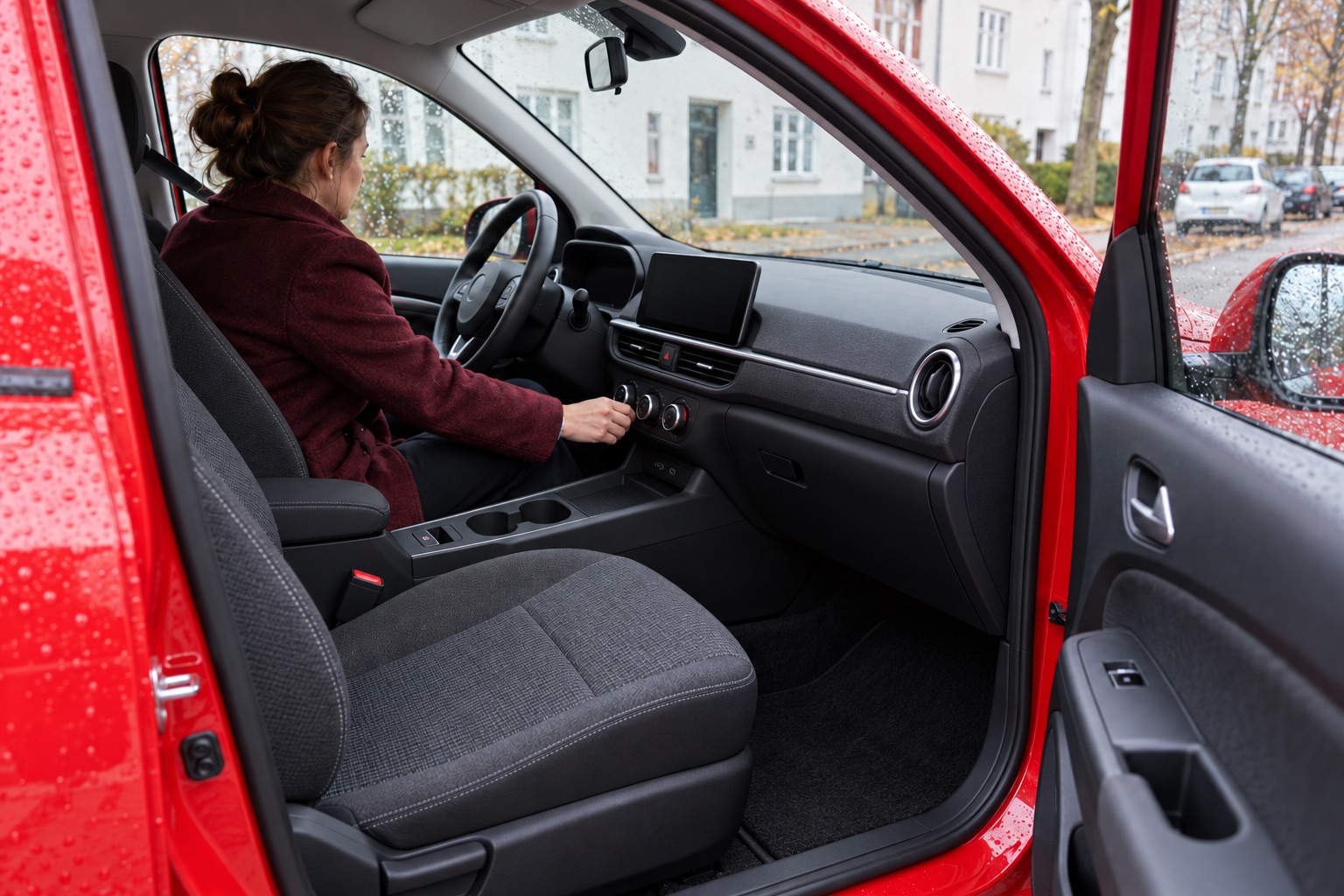 Varmebetjening i en fiktiv rød elbil; ikke en Hyundai Ioniq 3 eller dokumentation af prisændringen. AI-genereret, fotorealistisk temabillede; viser ikke den konkrete begivenhed.